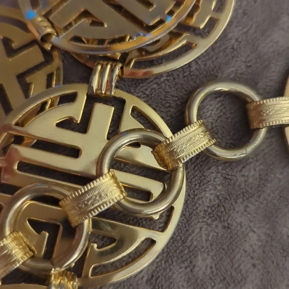 ‎Vintage gold tone metal belt